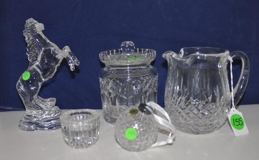 5 pieces of Waterford crystal: 5 pieces of Waterford crystal: rearing horse, biscuit jaw pitcher, ornament, votive, 20th century