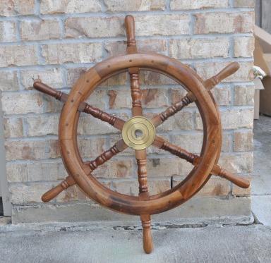 Mahogany ship's wheel with brass accents: Mahogany ship's wheel with brass accents 30" round , 20th century