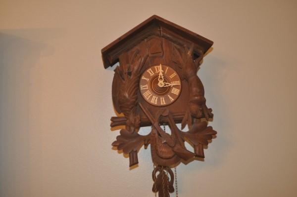 Black Forest cuckoo clock: Black Forest cuckoo clock, crest is missing, rabbit & chicken motif, 2 weights, body 12" l x 15" h, 20th century