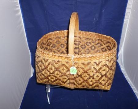 Cherokee river cane splint basket:: Cherokee river cane splint basket: This is a fine example of a Cherokee river cane split basket with a complex design that is also on the side panels 15 1/2" x 16", early 20th century