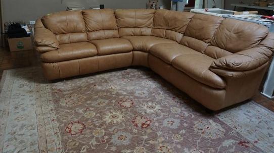 Brown leather sectional sofa 153" w x 30" d x 33" h,: Brown leather sectional sofa 153" w x 30" d x 33" h, 20th century