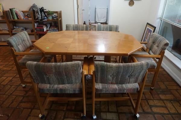 Dining room table, 1 leaf, 6 upholstered chairs on: Dining room table, 1 leaf, 6 upholstered chairs on casters, 20th century