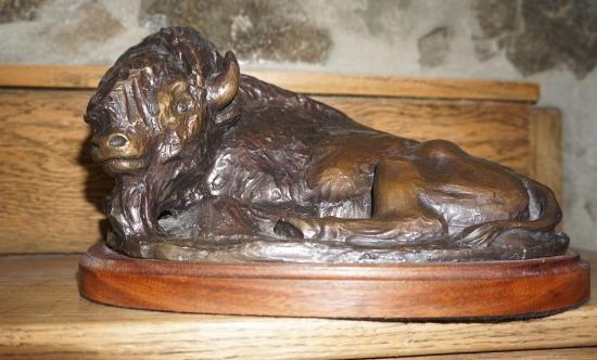Bronze buffalo sculpture by Ace Powell, 76/100, 12" x: Bronze buffalo sculpture by Ace Powell, 76/100, 12" x 8" x 6": Asa Lynn "Ace" Powell (1912 – 1978) was an American painter, sculptor, and etcher of genre scenes and imagery relating to Indians, cowb