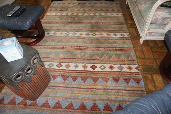 Lots of rugs:: Lots of rugs: 75% wool, 25% cotton rug from India 57"x 93", hand hooked throw rug 2' x 4', Safavieh 100% wool rug 9" x 12", 3 runners 2'2" x 7'7", 2 nylon area rugs 24" x 48", 7 bath mats, 20th centur