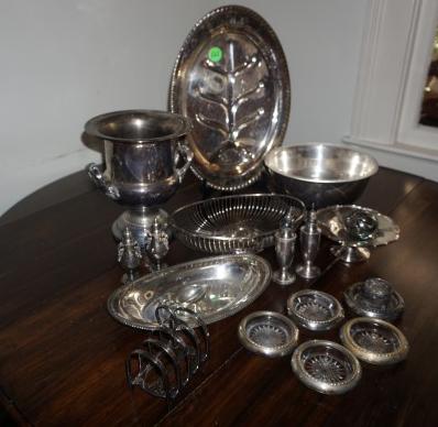 Assortment of silver plate: Assortment of silver plate: meat tray, champagne bucket, bowl, bread basket, bread tray, small bowl, 5 coasters, toast holder, salt & pepper shakers, 20th century