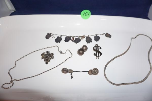 Sterling jewelry 2.7 troy ounces: Sterling jewelry 2.7 troy ounces: 2 chains, pair of earings, money clip, cuff links, broach, charm bracelet with 9 charms, 20th century