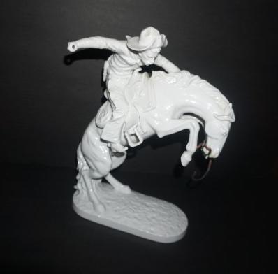 Gorham white porcelain Fredrick Remington style man on: Gorham white porcelain Fredrick Remington style man on horseback "Bronco Buster" 8"w x 4" d x 12" h, 20th century