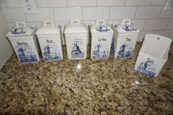 Antique blue & white porcelain canister set from: Antique blue & white porcelain canister set from Germany: Barley, Rice, Coffee,Tea, 1 plain, salt box with no lid, some crazing & chips, 19th century