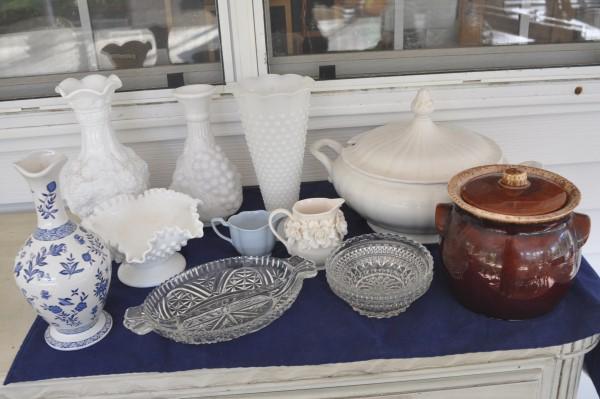 Assortment of milk glass, porcelain & pottery: Assortment of milk glass, porcelain & pottery: 3 milk glass vases & 1 fluted center bowl, covered soup tureen by Dianondstone, Italy, blue & white vase by Coalport, 2 porcelain creamers, covered bean