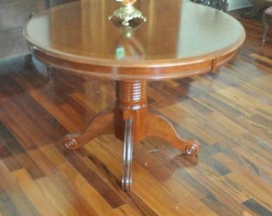 Round mahogany table with pedestal base, 4 legs, carved: Round mahogany table with pedestal base, 4 legs, carved feet 41" round x 29" h, 20th century