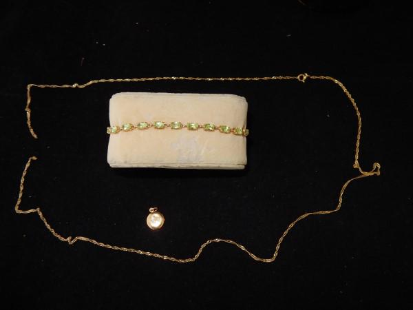 10K Gold Jewelry: 10K gold bracelet with peridot stones, 26" gold chain (to be repaired),small gold locket