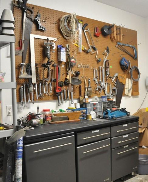 Ultimate Tool Cabinet: Ultimate tool cabinet with contents and wall of tools: work lights, meters, power tools, hand tools, wrench sets, hand saws, vice, nuts, bolts, screws, nails, paint brushes, etc.