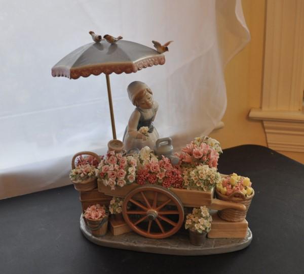 Lladro "Flower Cart Girl": Lladro, "Flower Cart Girl" retired, ( 1 bird on top reattached), 20th century