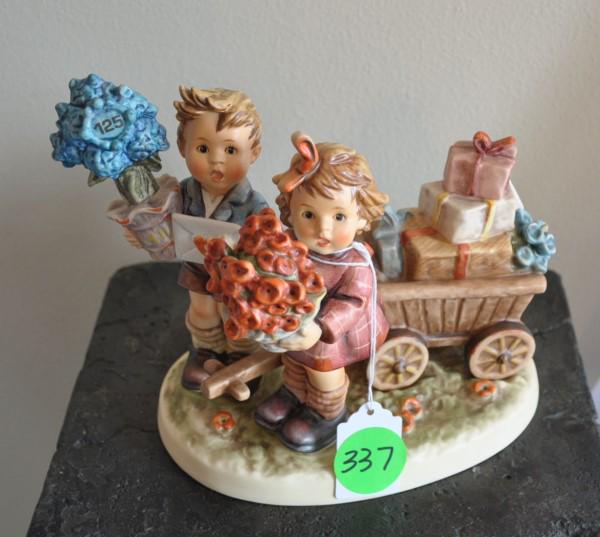 Hummel Figurines: Hummel by Goebel, Germany: #751 "Loves Bounty", 20th century