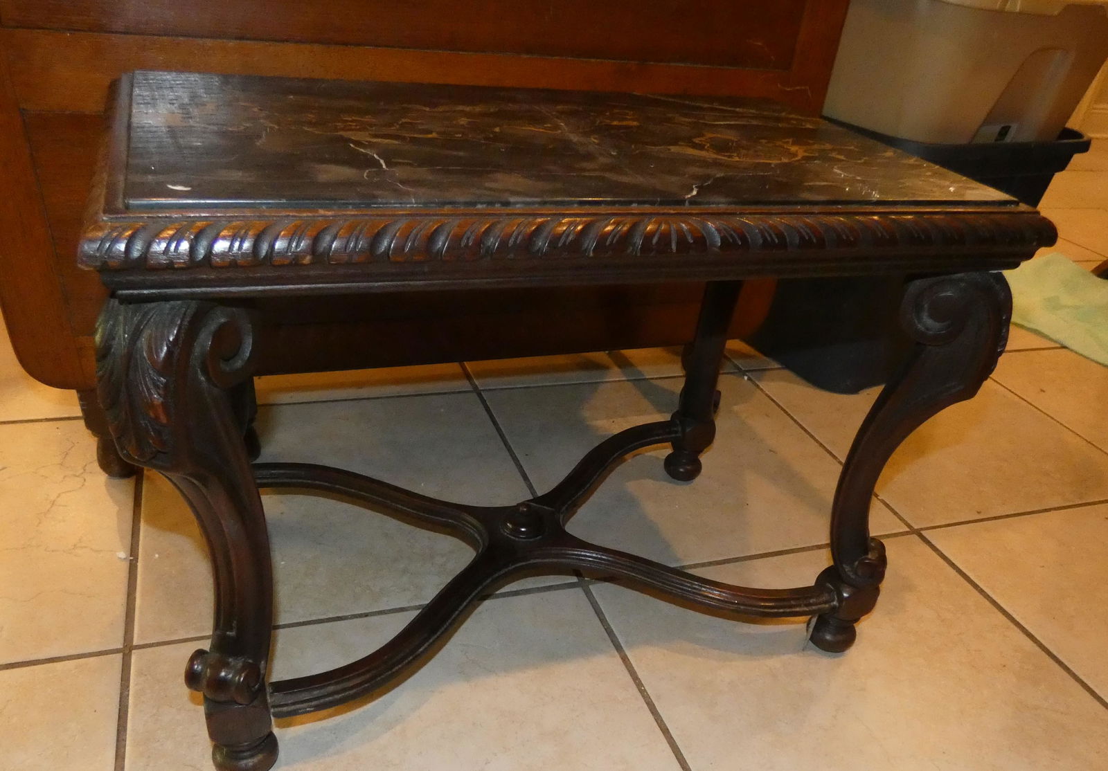 Black marble top hand carved coffee table (1 of 3)