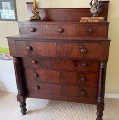Walnut Empire chimney stack dresser: Walnut Empire chimney stack dresser, 7 drawers total, columns on side of piece, wood pulls, on casters, late 19th century