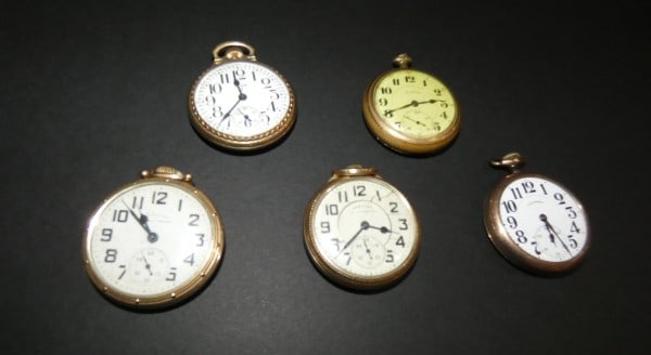 5 antique & vintage gold tone open face Railroad watches: 5 antique & vintage gold tone open face Railroad watches: Hamilton, 10K Gold Filled, #K376862, Elgin, 10K Rolled Gold Plate, #8213925, Hamilton Railway Special #P378984, Illinois #10619173 (watch face