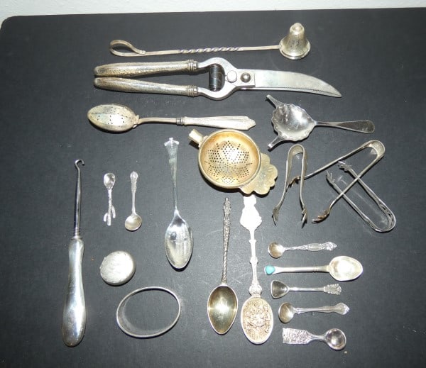 Large assortment of interesting sterling items: Large assortment of interesting sterling items: garden shears, candle snuffer, 2 tea strainers & spoon, 3 pairs of tongs, napkin ring, pill box, button hook, spoon "Public High School Grundy Center",