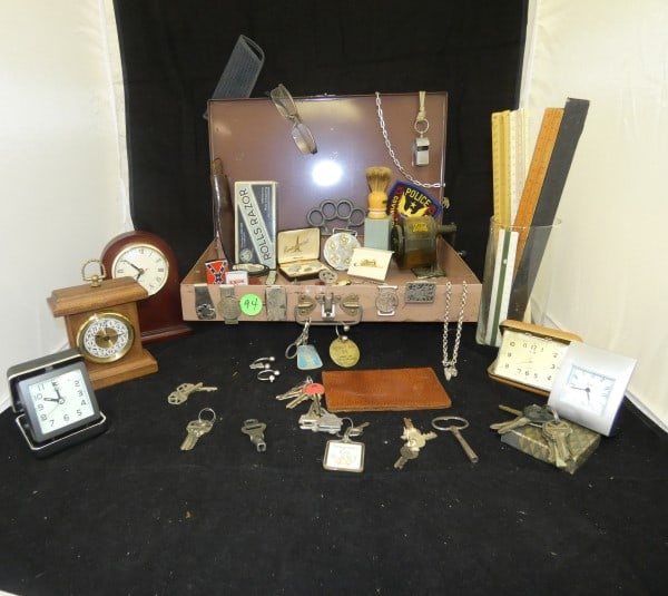 Vintage tin box filled with antique & vintage Gentleman's collectibles: Vintage tin box filled with antique & vintage Gentleman's collectibles: 5 clocks, 3 are travel clocks, 10 knives, some Swiss Army, pencil sharpener, belt buckle, iron knuckles, old Rolls Razor in orig