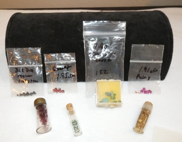 Diamonds, black diamonds, garnets, gold, emeralds: Diamonds, black diamonds, garnets, gold, emeralds, 6 diamonds .21 ct wt I.S.I., black diamonds 1.49 ct wt., ruby 1.91 ct wt,, garnets 1.95 ct wt, emeralds 2.90 ct wt, assortment of CZs, 21st century