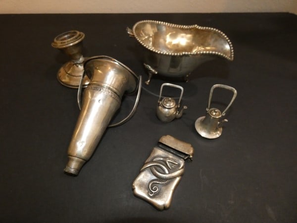 Lot of sterling, some broken: Lot of sterling, some broken: Victorian match safe with snake design, 2 small tea pots, weighted candle stick, bud vase, footed gravy boat, 216 grams (candle stick not included), early to mid 20th cen