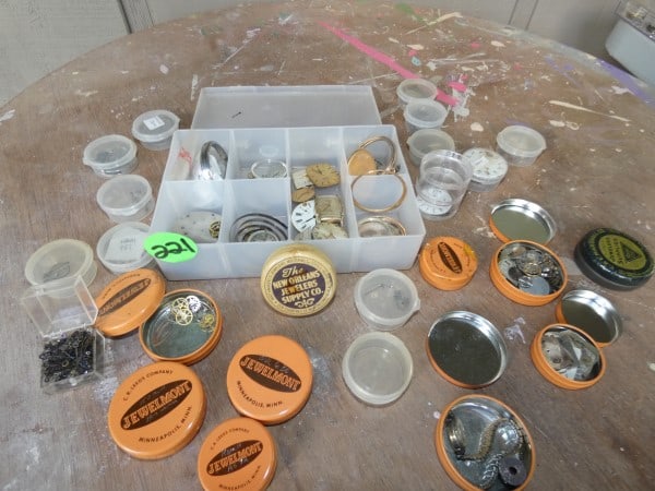 Jewelers Supply tins with repair parts for Pocket Watches: Jewelers Supply tins with repair parts,for Pocket Watches: hands, faces, main springs, gears & misc, mid to late. 20th century
