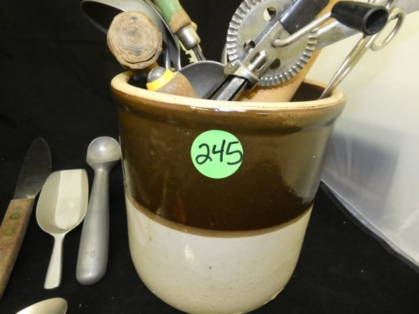 Antique & vintage kitchen ware: Antique & vintage kitchen ware: large crock, old alumium steamer pot by Wearever, 2 egg beaters, old mallard, alumium ladle & 3 spoons, 2 ice cream scoops, knives, 2 can openers, ice pick, grill fork,