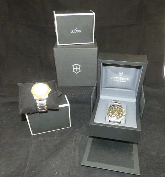 2 men's chronographs in original boxes: 2 men's chronographs in original boxes: Bulova men's watch "Caravelle" in original box, Victorinox Swiss Army watch, late 20th century