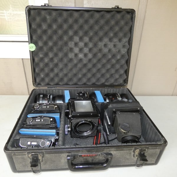 Mamiya "The Professional "camera with camera system in fitted & padded case: Mamiya "The Professional "camera with camera system in fitted & padded case by BOSCO, 3 lens: Sekor 65mm #40619, Sekor 90mm #15954, Sekor 180mm #11090, 3 film boxes, expandable lens, Rb 67 lens, mid 2