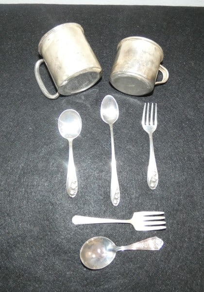Sterling baby cups & baby flatware: Sterling baby cups & baby flatware: 1 cup by E. H. Hufnagel & 1 cup marked "Sanitary Sealed Edge", 3 piece child's set by Gorham "Lily of the Valley", fork & spoon, 219 grams, early-mid 20th century