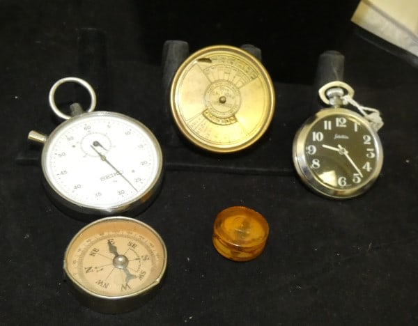 Interesting stop watches, calander, compasse: Interesting stop watches, calander, compasses" Seiko & Satellite, brass 50 year calander 1973-2022, 2 vintage compasses, mid 20th century