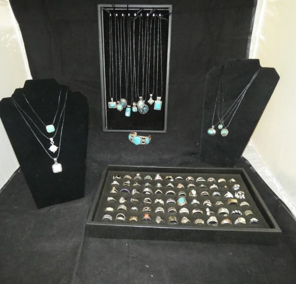 Vintage & Retro sterling jewelry: Vintage & Retro sterling jewelry: 15 turquoise pendants on black cords, Navaho Indian sterling & turquoise bracelet, 60+ rings of various sizes with natural & cut stones, 150 grams, (does not include 