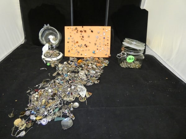 2 jars of hundreds of sterling single earrings with natural & cut stones,: 2 jars of hundreds of sterling single earrings with natural & cut stones, mid to late 20th century