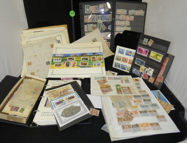 Large assortment of antique & vintage cataloged & loose stamps: Large assortment of antique & vintage cataloged & loose stamps from from Around the World. : Examples are Samoa, U S Parcel Post, State of New York, Australia, France, Jahre, Israel, Revenue, Argentin