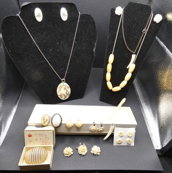 Antique & vintage hand carved bone & sterling jewelry: Antique & vintage hand carved bone & sterling jewelry: necklaces, bracelet with 2 teeth, antique bone pin, 2 rings, 6 pairs of earrings, 3 carved roses, bone pick, some jewelry is from Fairbanks, Alas