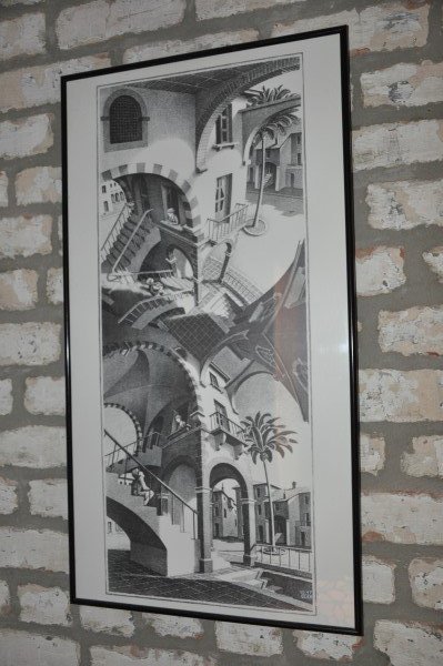 Framed European scene, site 2'4" H x 11 1/2" W, with: Framed European scene, site 2'4" H x 11 1/2" W, with frame 2'6" H x 1'4" W, Menu from "Jonathan's Restaurant in New Orleans" site 1'5" H x 11" W, with frame 1'10"H x 1'5" W