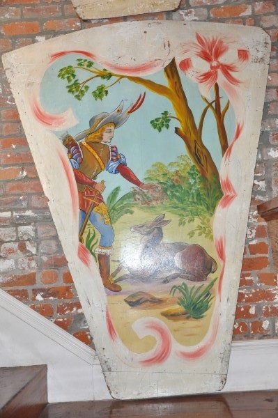 Panel from an antique carrousel from Paris, France of a: Panel from an antique carrousel from Paris, France of a story book scene of Don Quixote with a deer, 6'2" H x 4'7" W (top), 1'10" W (bottom)