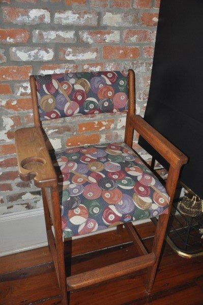 Tall oak chair with pool ball upholstery 3'8" H x 2'1": Tall oak chair with pool ball upholstery 3'8" H x 2'1" W x 1'8" D, pool ball clock 1' square
