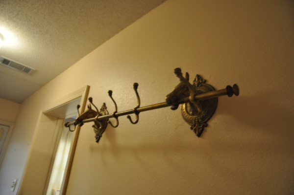 Brass coat/hat rack with horse motif: Brass coat/hat rack with horse motif