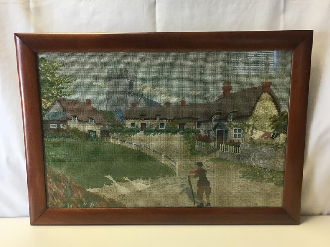 Needlework of Godshell on Isle of Wight: Provenance at the reverse handwritten in pen. Cottages with castle in background. Man walking with two geese. Nicely done. 18-1/2" x 26-1/2" framed.