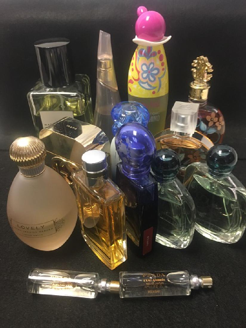 Lot of Designer Perfumes inc. Chanel, Gucci, Jacobs: Lot includes Gucci Guilty eau de toilette, 2.5oz. (full); Marc Jacobs eau de toilette, 10oz. (3/4 full); Chanel Allure, 1.7oz. (full); Roberto Cavalli eau de parfum, 2.5oz. hand painted bottle (full);