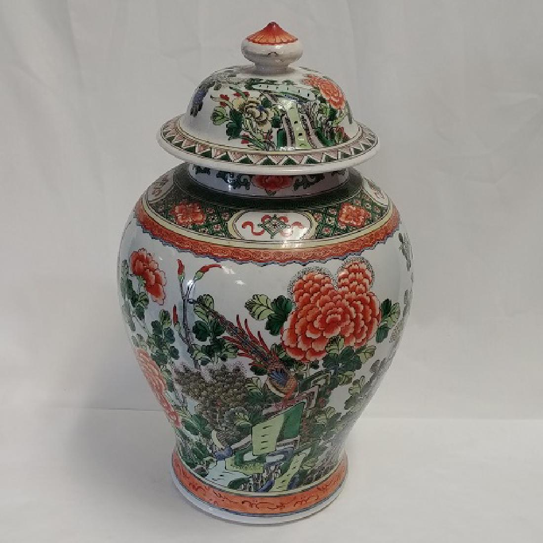 Chinese Ginger Jar with Lid: Large orange and green stoneware glazed and handpainted jardineer. Interior rim chip on lid. 16" high with lid