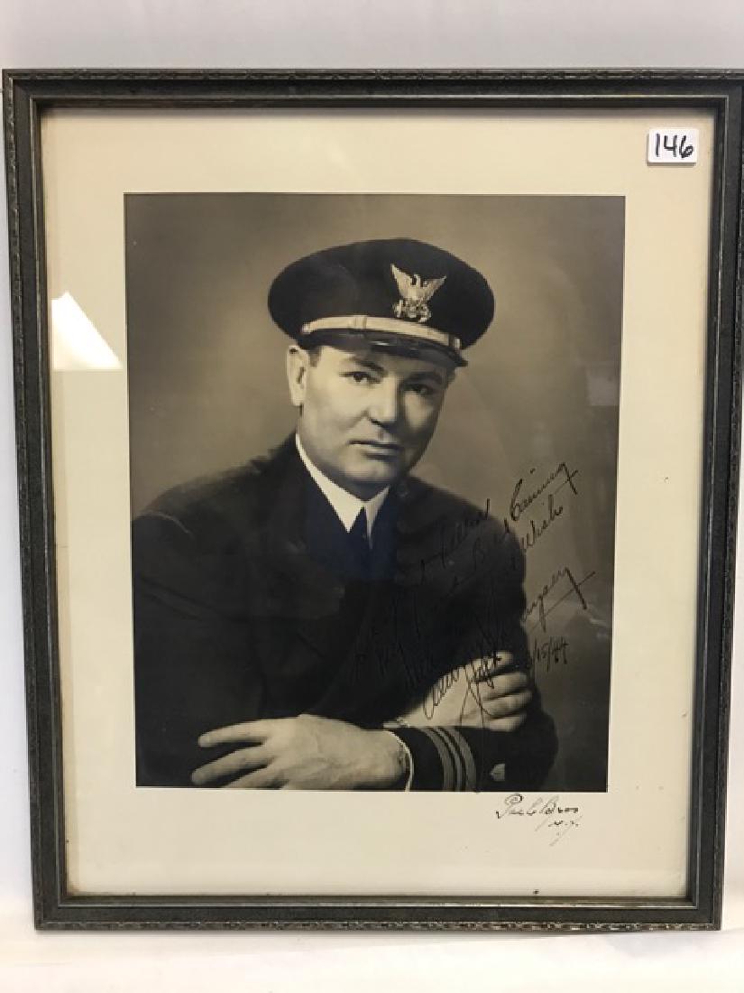 Jack Dempsey Signed Coast Guard Photo: Jack Dempsey signed and inscribed black and white photo of the famous boxer in his Coast Guard uniform in 1944. The inscription reads, "To a great fellow my friend Bill Canning, with every good wish,