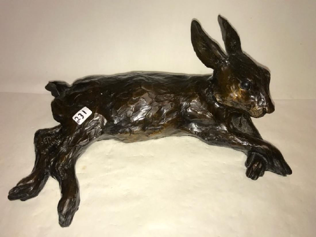 Bronze Reclining Rabbit: Signed W. Turner, 115/200, 1996. 12" long