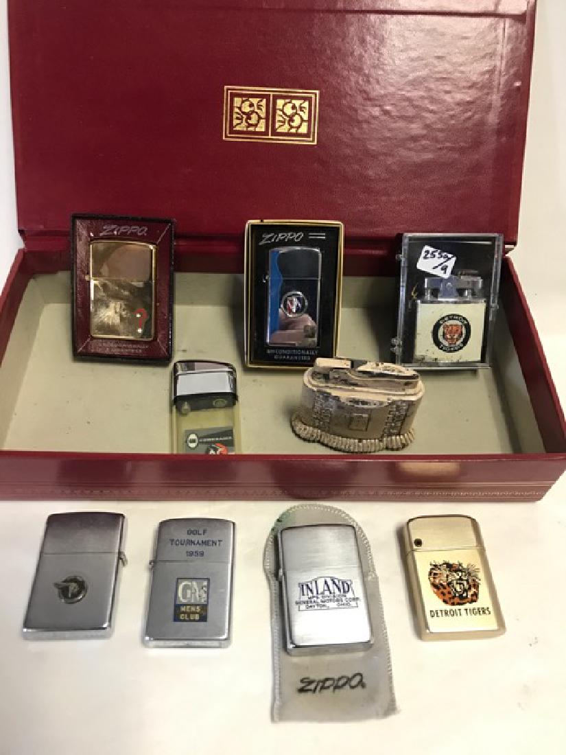 Lot of Nine Automobile/Detroit Related Lighters: Detroit Tigers 1968; Detroit Tigers Eternalite; Zippo Buick; General Motors Corp; GM Men's Club Golf Tournament 1959, N'naco; GM Powerama, AC; Pontiac Desktop lighter; Pontiac with Chief logo; and a l