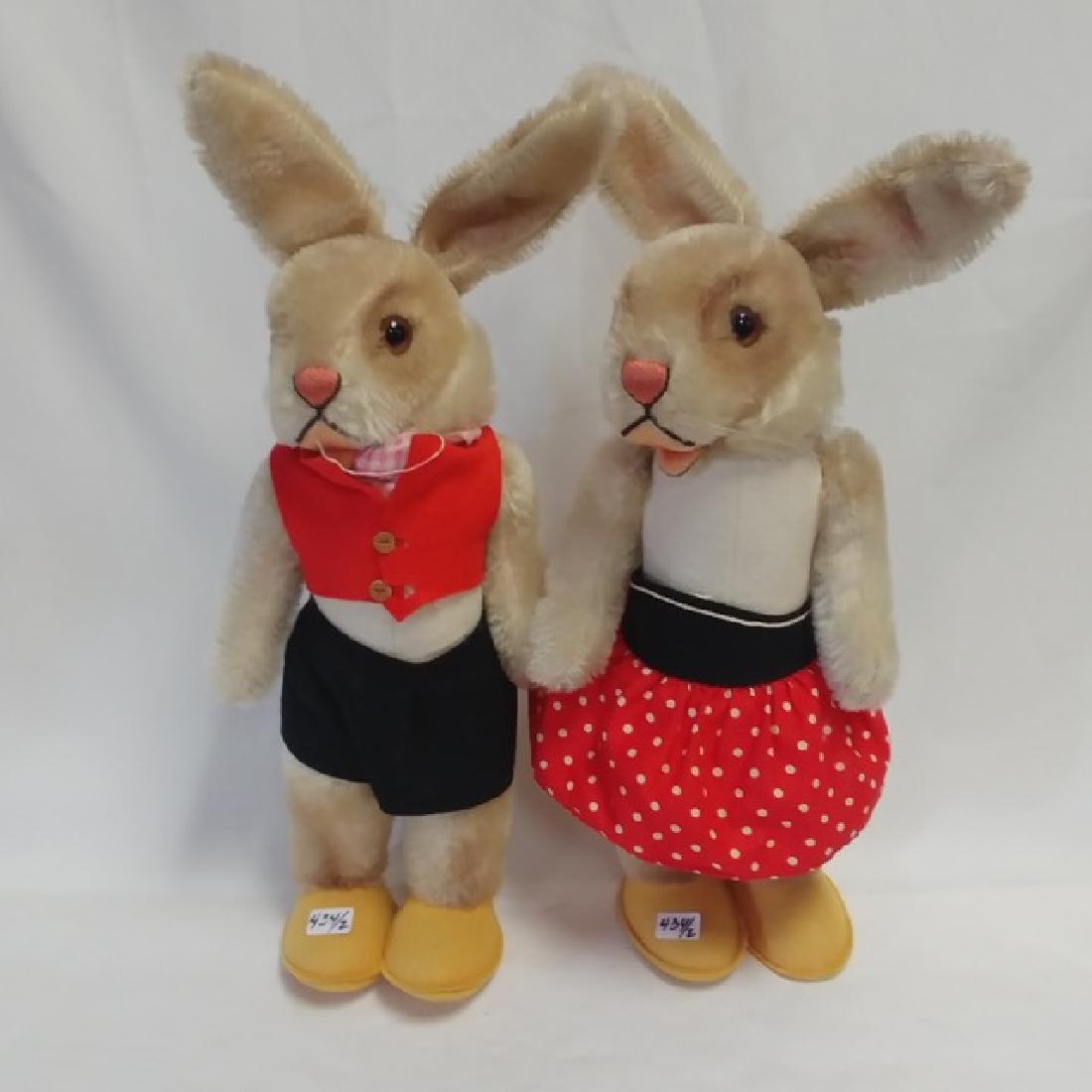 Pair of Steiff Rabbits: Black and red clothing, yellow shoes. 16" with ears up.