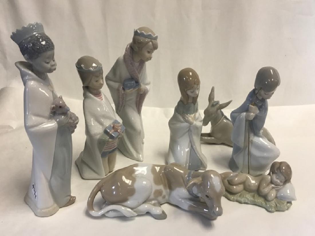 Lladro Children's Nativity (8): Eight pieces in the lot to include: Baby Jesus, Mary, Joseph, Three Kings, a donkey and a cow. 8-1/2" to 4"