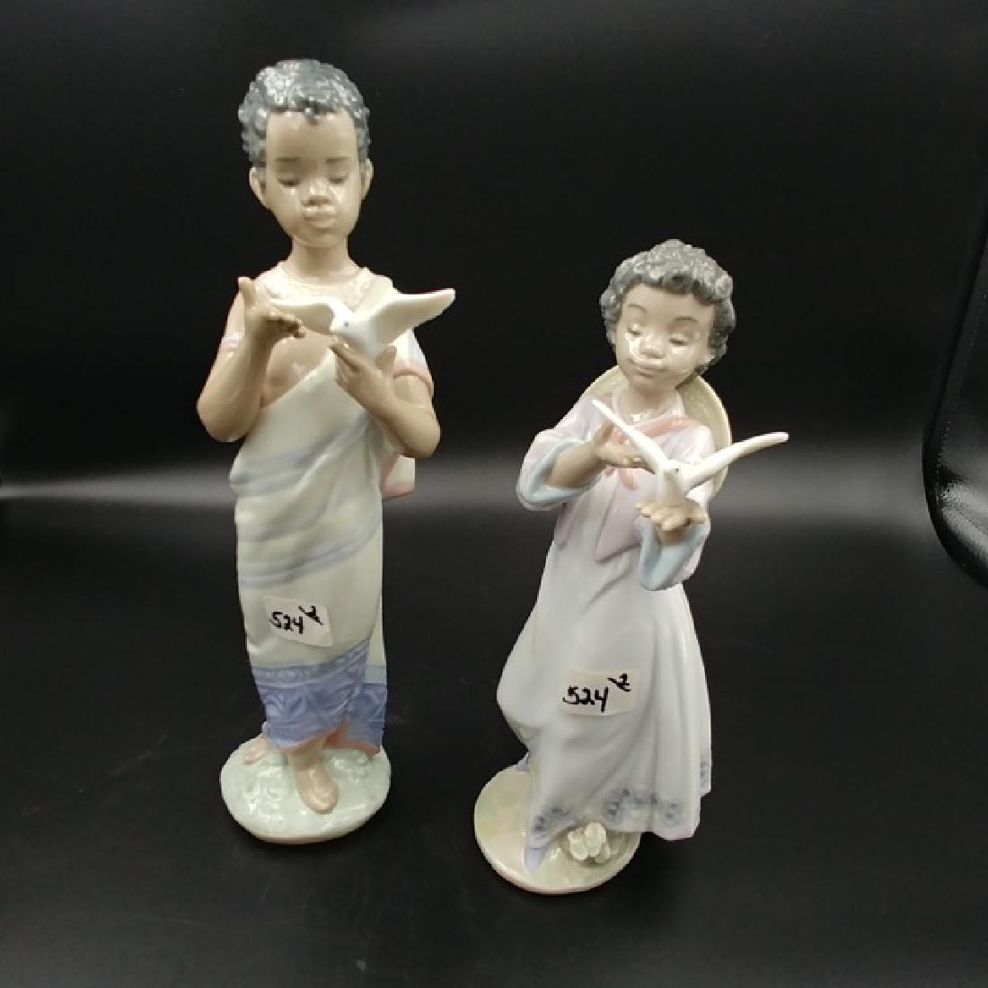Lladro Black Legacy Collection Figures with Doves: Lladro 6189 & 6154. 9-1/2" high; 8" high