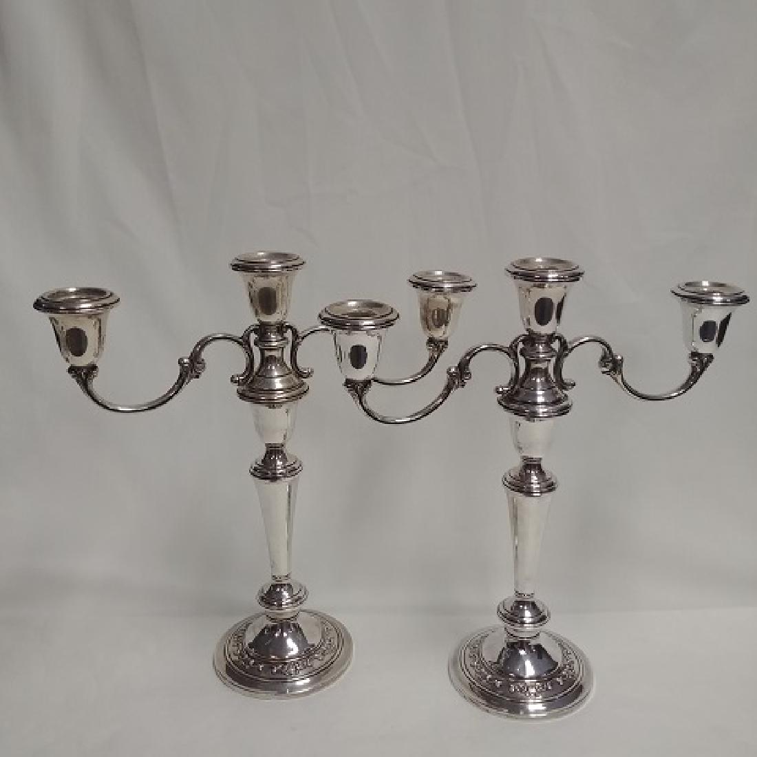 Pair Sterling Silver Gorham Candelabra: Three branch Gorham candelabra screws into single candlestick base. Marked Sterling Cement Filled reinforced with rod. Ensuite to Lot 153 13" high