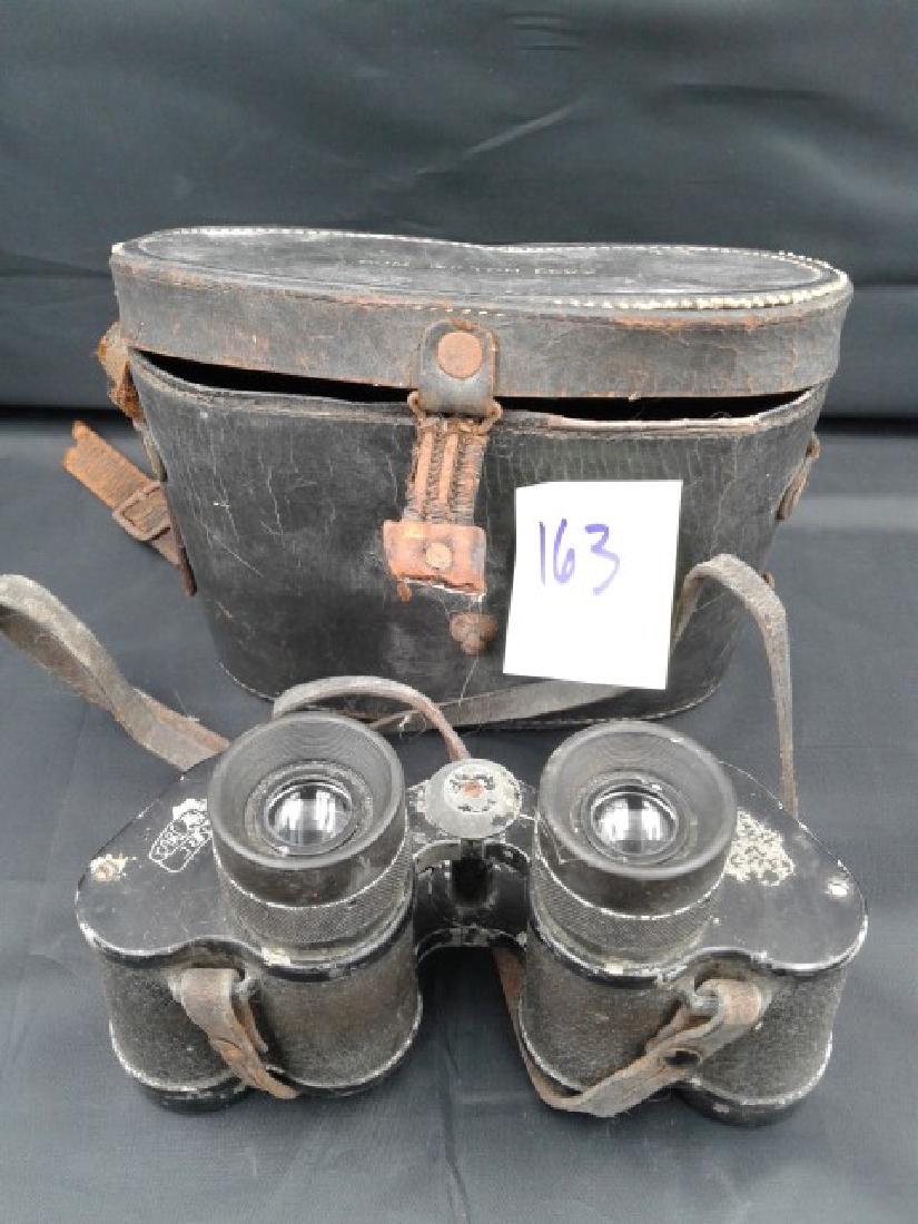 WWII Carl Zeiss Jena Binoculars: In leather case. Marked Com. Milton Levy at the top in gold stamp. in fair condition. 6" wide in the case.